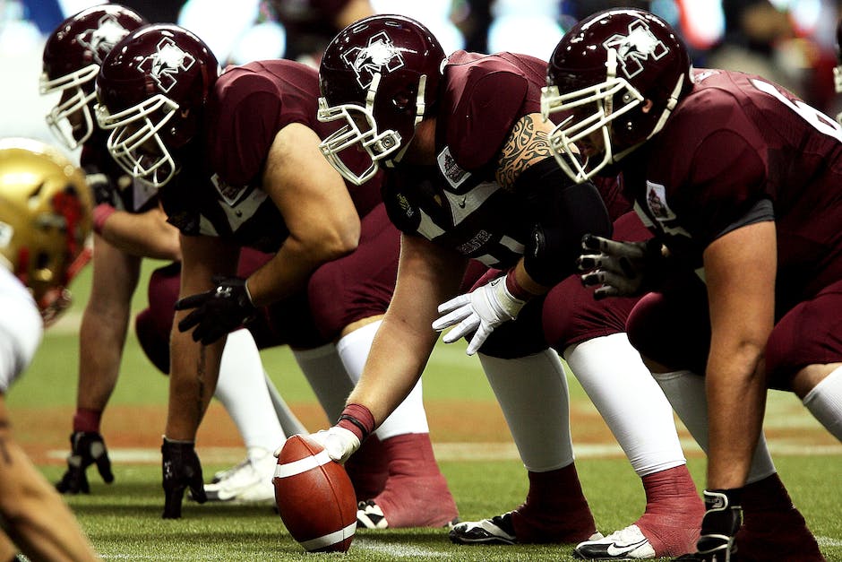 Image depicting different football positions, including quarterback, running back, wide receiver, tight end, and offensive lineman.